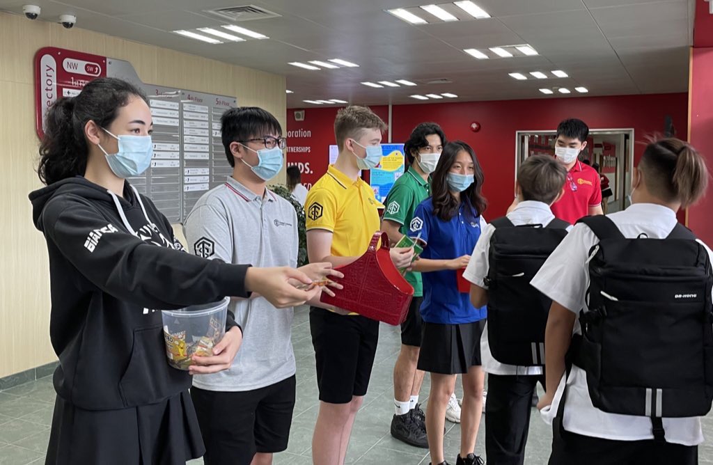 TISHSCouncil's tweet photo. Introducing the 2021-2022 student council executives! We welcomed students with a sweet treat on the first day of school🍬
Looking forward to an amazing year together!! 🥳🥳
#tismacao https://t.co/gYQhmltBK1