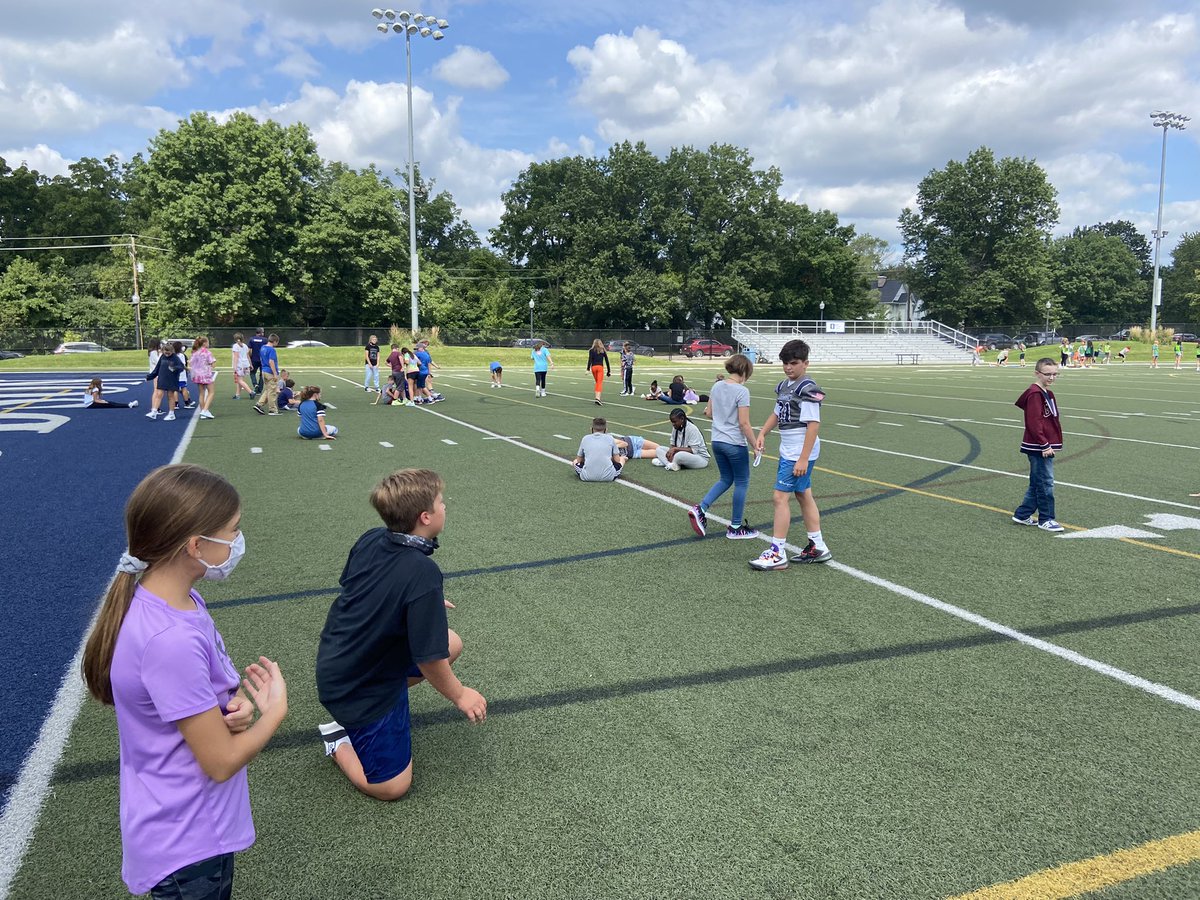 Mrs_VickyCulver's tweet photo. Beautiful Friday afternoon - Team Advisory outside on Malson Field. #6Integrity https://t.co/LNRny92c3b
