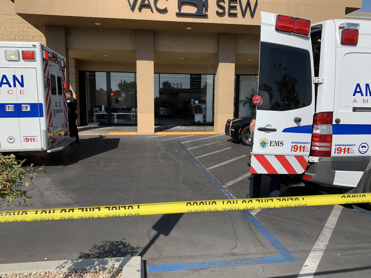 Sagl123's tweet photo. Happening now:  A recently fired employee drove his car into Authorized Vac and Sew.  3 employees were injured one transported to hospital. The suspect is in custody. He was fired this morning. @ABC30 https://t.co/GpTNeTwKaj