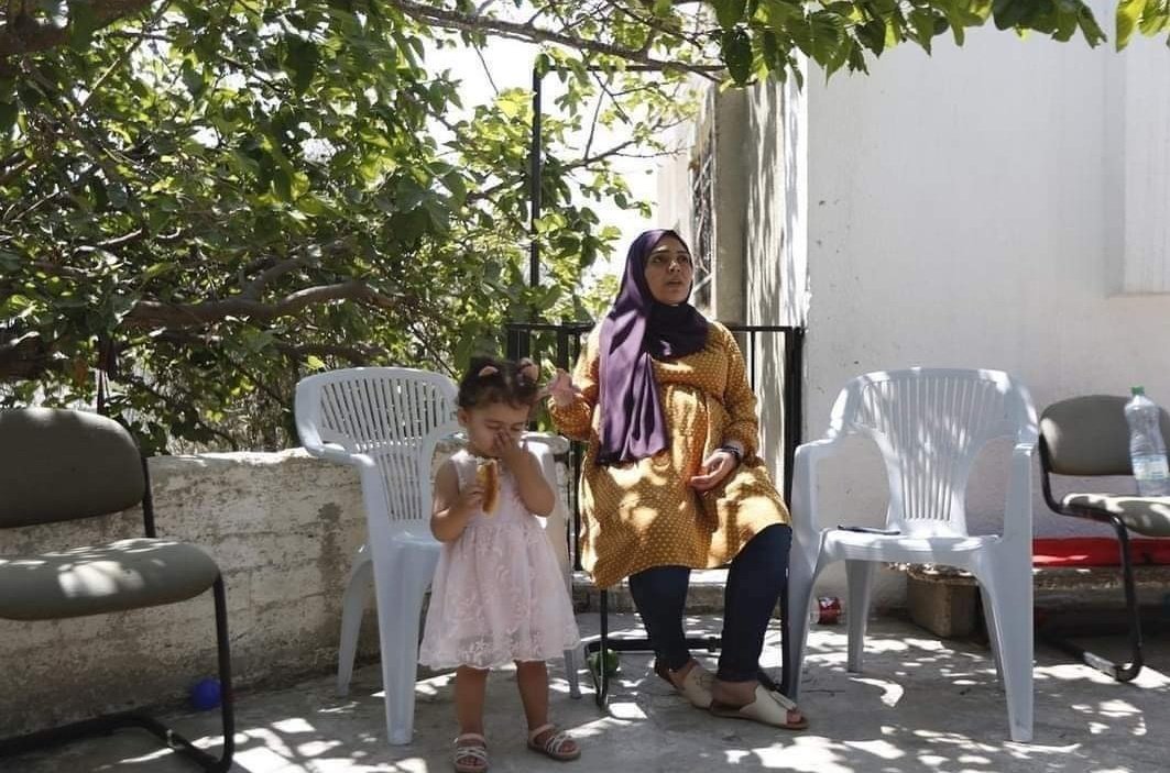 SaraReyi's tweet photo. Resistance until Freedom.
#Palestinian ex-prisoner #Anhar Al-Deek enjoys her time with her family in their home in the village of Kafr Ni'ma, in the occupied West Bank. Al-Deek, on her 9th month of pregnancy, was released from Israeli prisons yesterday.
@SaraReyi https://t.co/2BGuleTld4