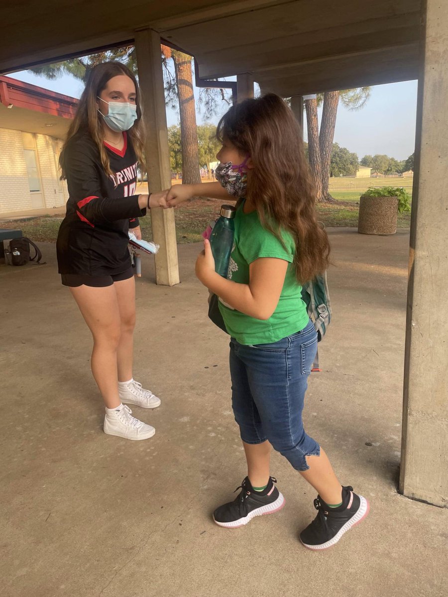 LieslJames's tweet photo. My favorite mornings are when I see our high schoolers mix with our elementary kids. Thank you to the Trinity High School Volleyball Team for your leadership. 💚🦜❤️🖤#ParrotPride #BorntoFly https://t.co/5l7gEoeHqM