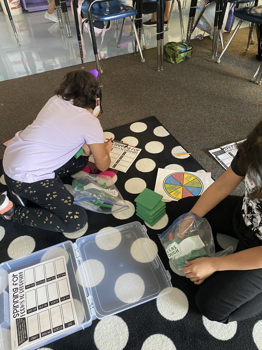 adrienmoore's tweet photo. Reviewing place value and comparing and ordering numbers. Love seeing my mathematicians working together! #pisdmathchat #FreemanES #teamworkmakesthedreamwork https://t.co/Ll8P6NxDBC