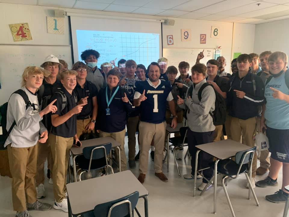 GOphsPIONEERS's tweet photo. The Football team's No. 1 jersey today goes to math teacher Mr. Stuart Book, Class of 2007, for his great example of Blue Pride! https://t.co/dwwKn6ruBw