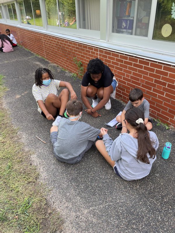 MsYesnes's tweet photo. What a fun challenge: who can make the longest strand?? Materials: rubber bands, paper, string, and labels all inside an envelope! Amazing collaboration, creativity, out of the box thinking, and team work! #ASMultiagefamily https://t.co/3oG9OQwWkI
