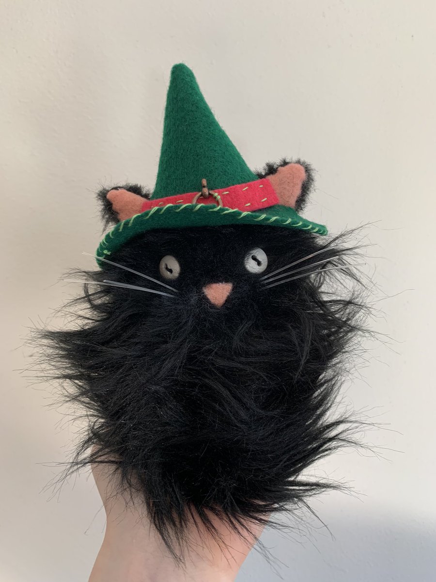 Had left over faux fur and made this little guy for a friend