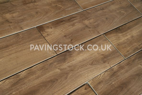 Brown Wood Porcelain Plank! PavingStock Porcelain Planks are long with 20MM Thickness paving slabs 
White heavy check mark pavingstock.co.uk 

#pavingstock #pavingstockuk #porcelainplanks #hsnero #porcelainpavers #porcelainplanks #planks #hsneroporcelainpaving