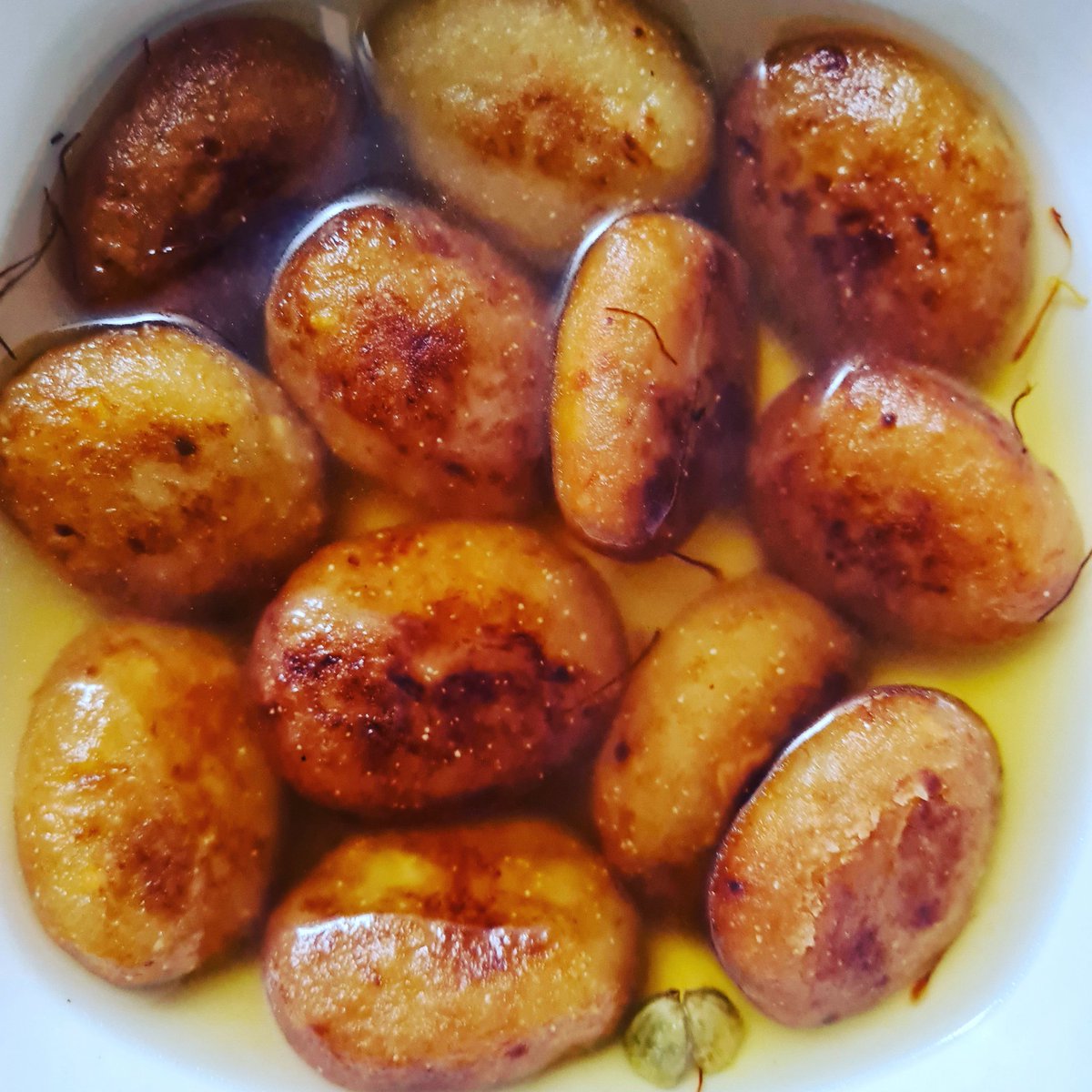 Rangaloo pithey. #Sweetpotato dumplings in a saffron sugar syrup! I am not fond of too many Indian sweets but I love any form of #pithey.

#foodblogger #foodblog #foodies #foodiepics #Foodie #foodphotography #bengalisweets #SweetSaturday #indianfood #saturdaykitchen #delicious