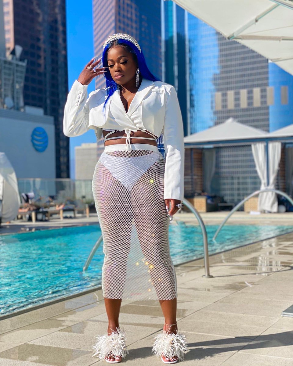 OloriSWANK's tweet image. Pool party at home. It’s giving homebody.     
     
Outfit Details:      
     
- Headband (coming soon) / Earrings (sold out) / Blazer (search “Norcross”) / Bikini (search “Ibiza”) / Skirt (search “Montenegro Midi”) : all from @SWANKblue      
     
- Shoes : @iamJenniferLe