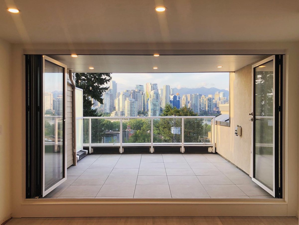 Lexario 4 panel, 12’x8’ split finish folding door installed in Vancouver at Oak St &amp; 7th Ave this year.  Our slim profiles offer more glass and less frame. 
Lexario.com
Showroom in Port Coquitlam. 
Competitive Pricing, Professional Installation, Great Lead Times.