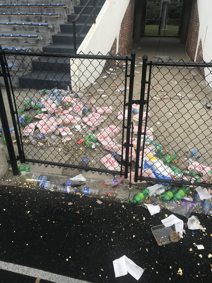 BallCoachMiller's tweet photo. Lions, your support for our teams (especially football) and your fellow students is AWESOME...but we are better than this. This is all trash from the student section last night. Let’s do it right next time! @ElkhartLions @EHSLionsStudent @ElkhartSS https://t.co/oYUMRuDrz8