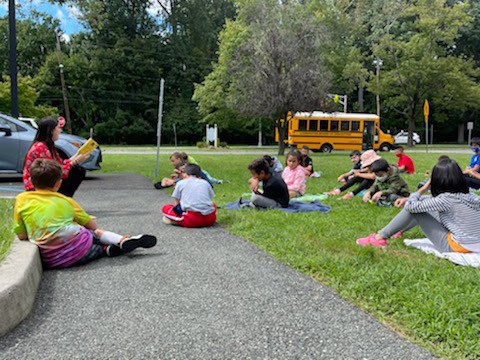 Wrapped up our first week of school by enjoying a read aloud in the beautiful weather! Excited for a fun year with this crew! #docsflock