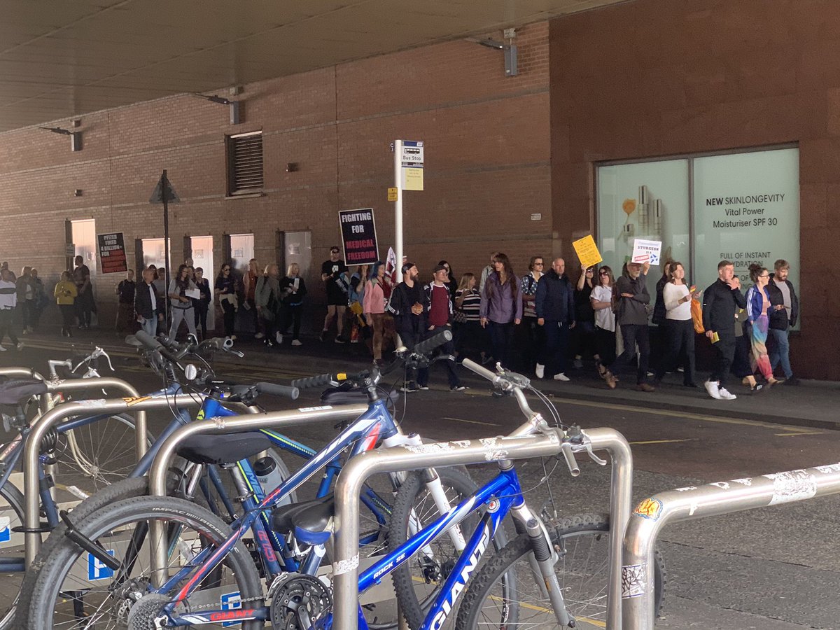 rachlougibson's tweet photo. Anti-vaccine protest currently underway marching through Glasgow City Centre, chanting against both the vaccine and to passers by to remove their masks, and appear to calling those who vaccinate pedos https://t.co/Y4amFrUxHA