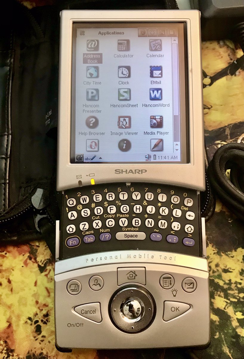 RetroFox8Bit's tweet photo. I wasn’t aware there was Linux PDAs like this Sharp Zaurus SL-5500. So far it charges and boots! Came with everything in the box for $5! 206Mhz, SD and CF slots and a hidden keyboard under a slider! Very neat and easy to type with. #SharpPDA https://t.co/Zz8I33GaYr