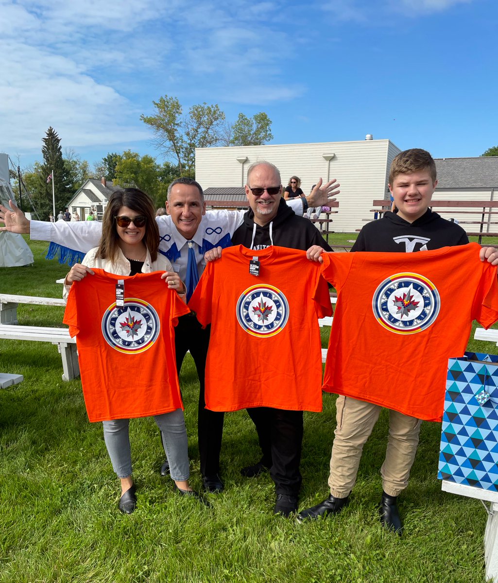 kevin_chief's tweet image. Thanks for the chance to dance the #GoertzenJig again with Premier @kelvin_goertzen Malachi &amp;amp; Kim with their new Indigenous Jets shirts! #SummerInTheCity☀️ 
#NorthEndBand🎻 🎸