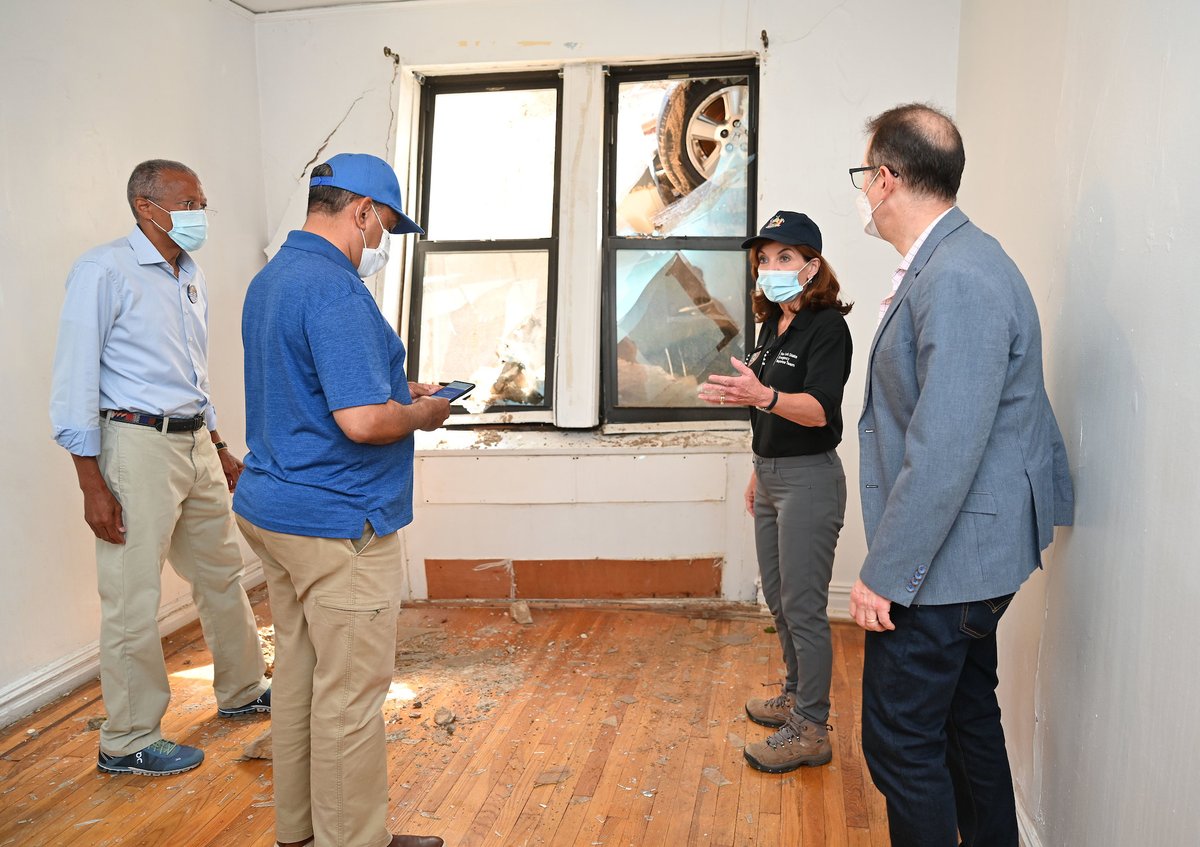 September 4, 2021 - Inwood, New York City - Governor Kathy Hochul tours a storm damaged apartment complex in the Inwood section of Upper Manhattan Saturday September 4, 2021. The heavy rains of Tropical Storm Ida loosened the earth forcing part of a parking garage to collapse and damaged a ground floor apartment on West 218th Street. It also destroyed a passenger vehicle in the process. (Kevin P. Coughlin / Office of Governor Kathy Hochul)

