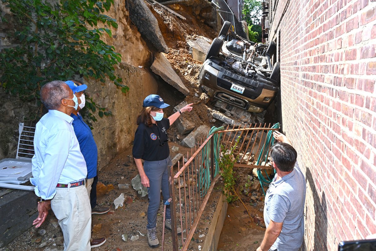 September 4, 2021 - Inwood, New York City - Governor Kathy Hochul tours a storm damaged apartment complex in the Inwood section of Upper Manhattan Saturday September 4, 2021. The heavy rains of Tropical Storm Ida loosened the earth forcing part of a parking garage to collapse and damaged a ground floor apartment on West 218th Street. It also destroyed a passenger vehicle in the process. (Kevin P. Coughlin / Office of Governor Kathy Hochul)

