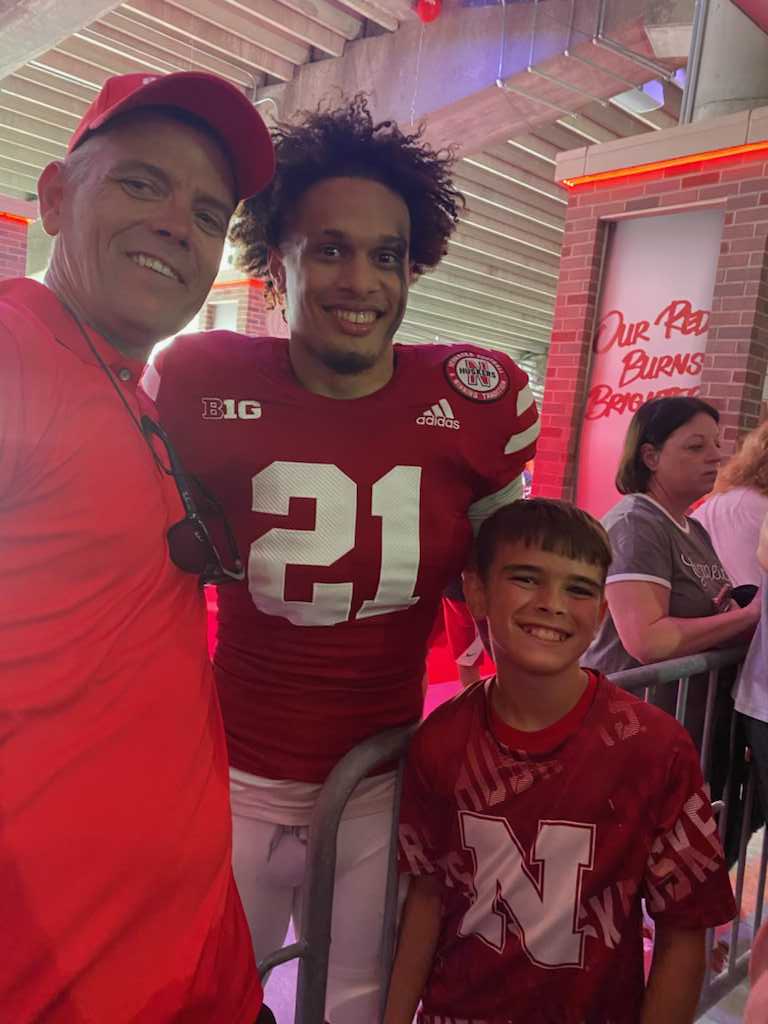 20016_beyond's tweet photo. My nephew and I with Noa Pola Gates after today’s Husker win. I worked with Noah’s uncle Ken at Skyline High School. Great to be in Lincoln with 85,000 fans. https://t.co/I1ukGnASP5