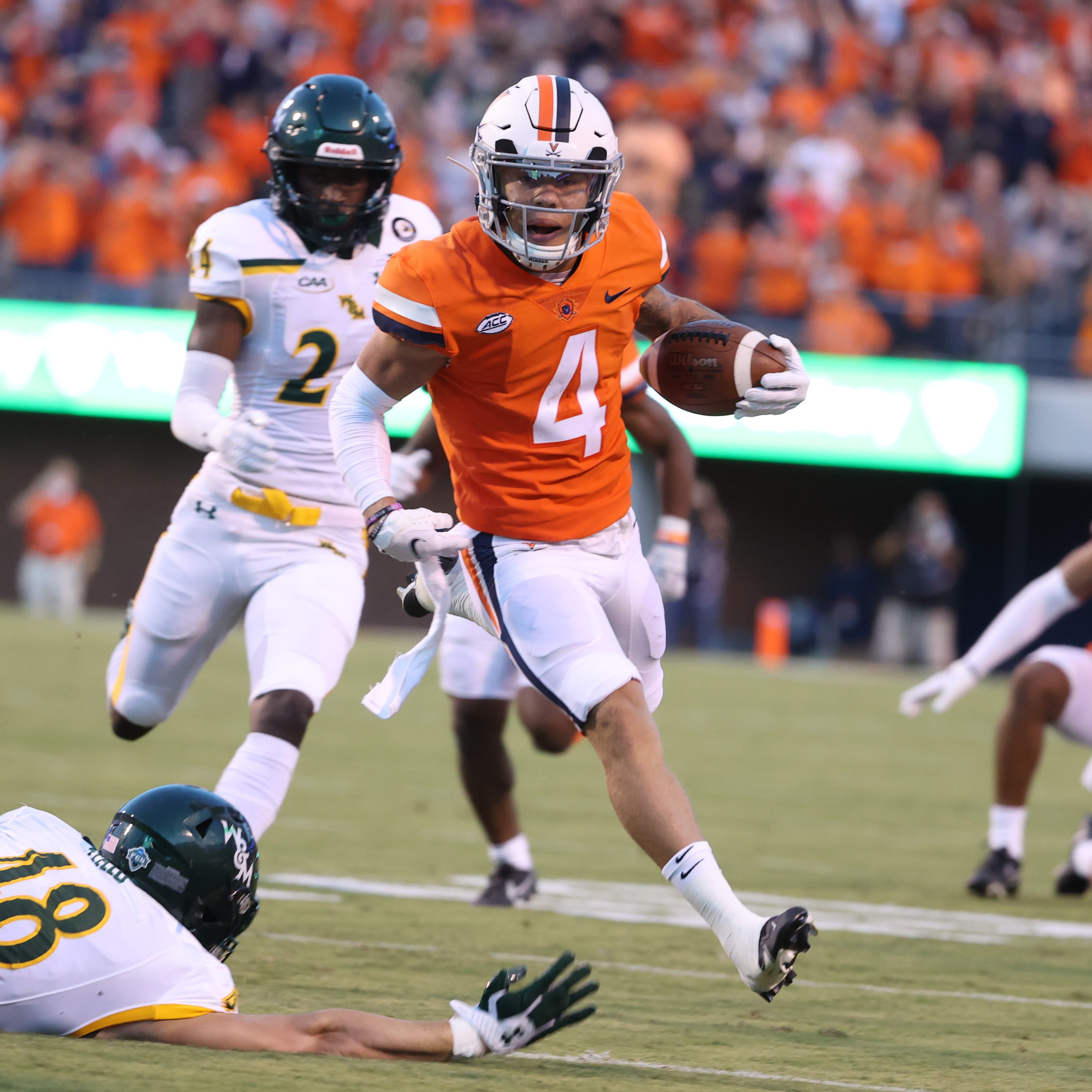 Virginia Cavaliers wide receiver Billy Kemp IV drives the ball.