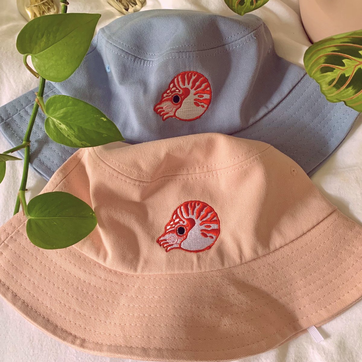 After a month-long hiatus during my move, my shop is now open again! Prints, stickers, pins, hats, and washi are available 💖🌿 I'm offering 15% off all orders using code AROWANA until the end of September! ✨