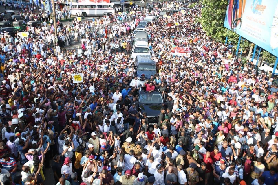 CassilingamG's tweet photo. Three years ago, on this day PM @PresRajapaksa led the #Janabalaya protest in Colombo, against former govt. where thousands attended to show their solidarity. 3 yrs later, #MahindaRajapaksa &amp; Prez @GotabayaR lead the nation, pulling us through one of the worst global pandemics. https://t.co/qRJbDF8bal