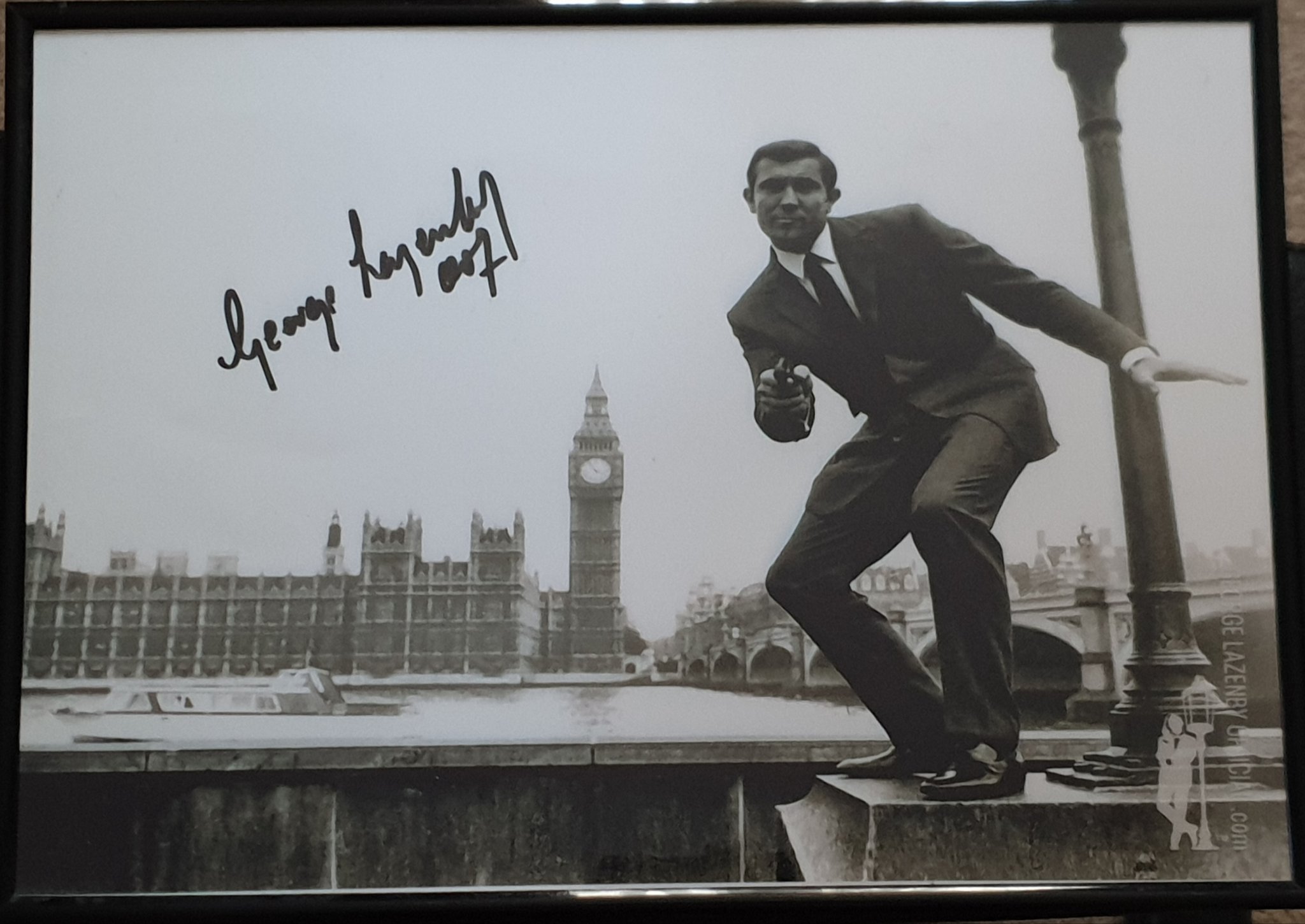 I got this signed photo from George Lazenby\s site. I enlarged it and framed it. Happy birthday George! 