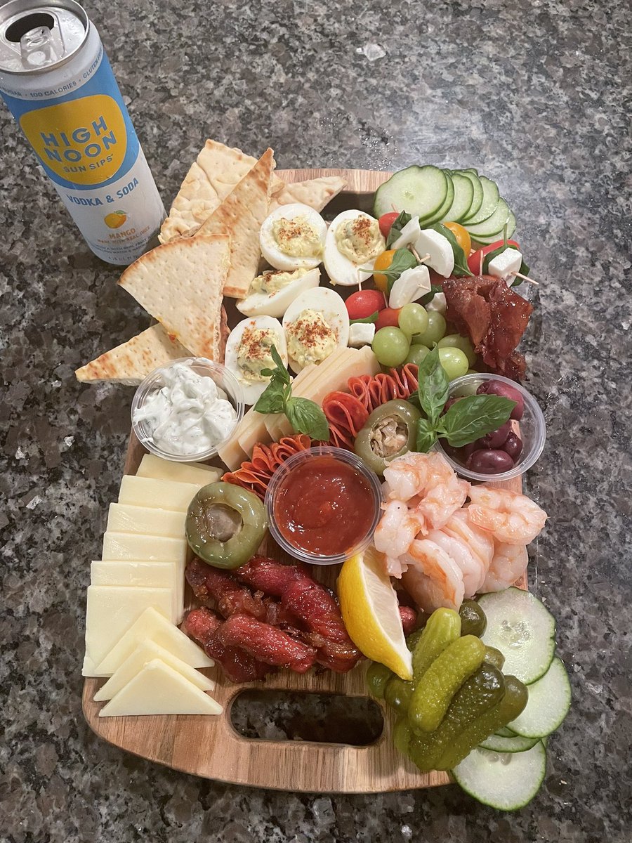 Cheers. #charcuterieboard @highnoonsunsips #yum