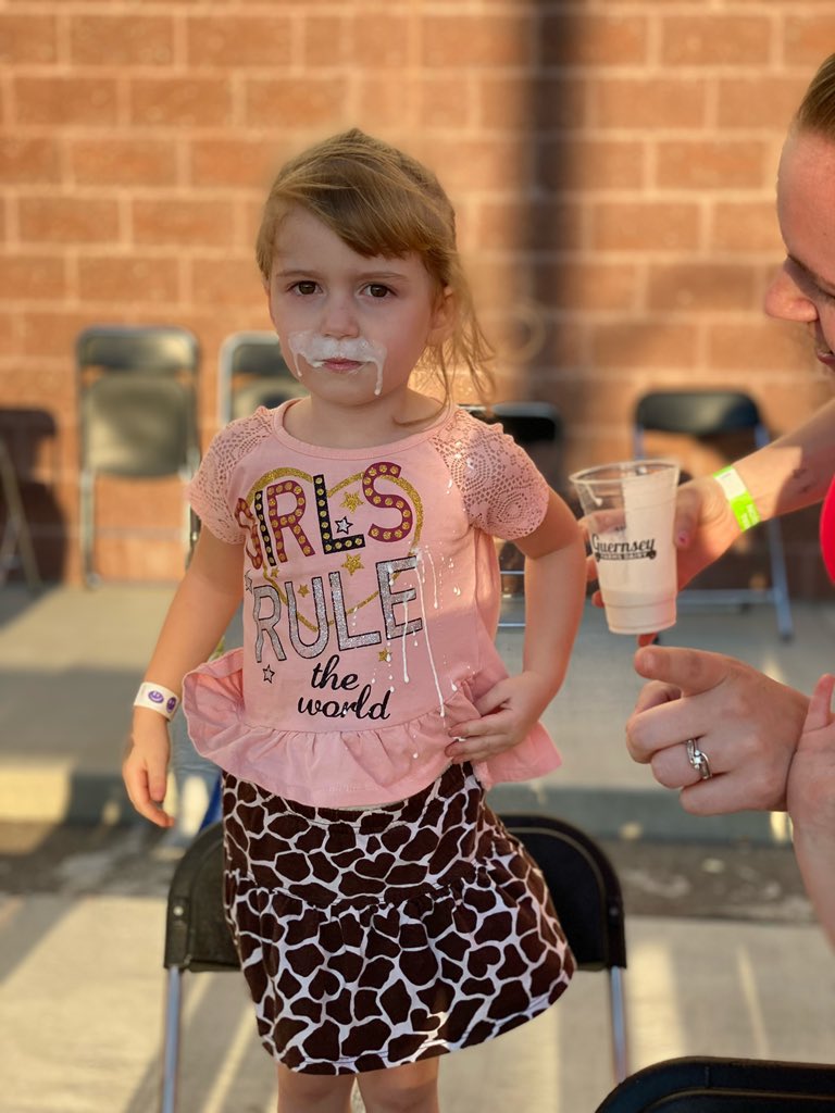 MIStateFair1's tweet image. Who has the better mustache??? Thank you @GuernseyDairy for the ice cream and milk😋