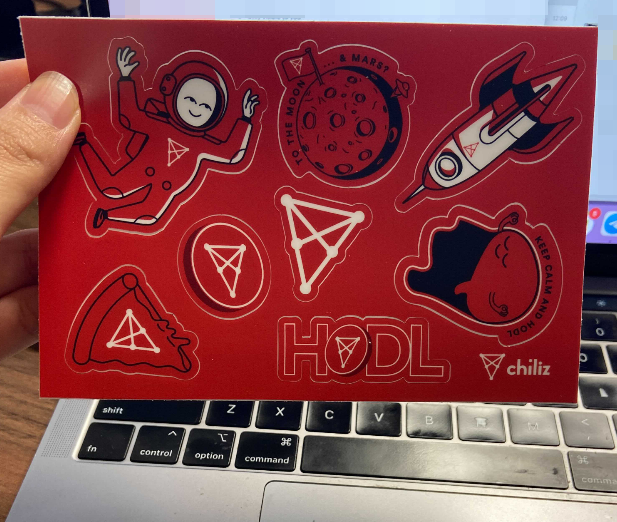 Chiliz's tweet photo. On an unrelated note...

These stickers just dropped in our office... 👀

Should we give some away? 🤔 https://t.co/SjV0NnPvNM