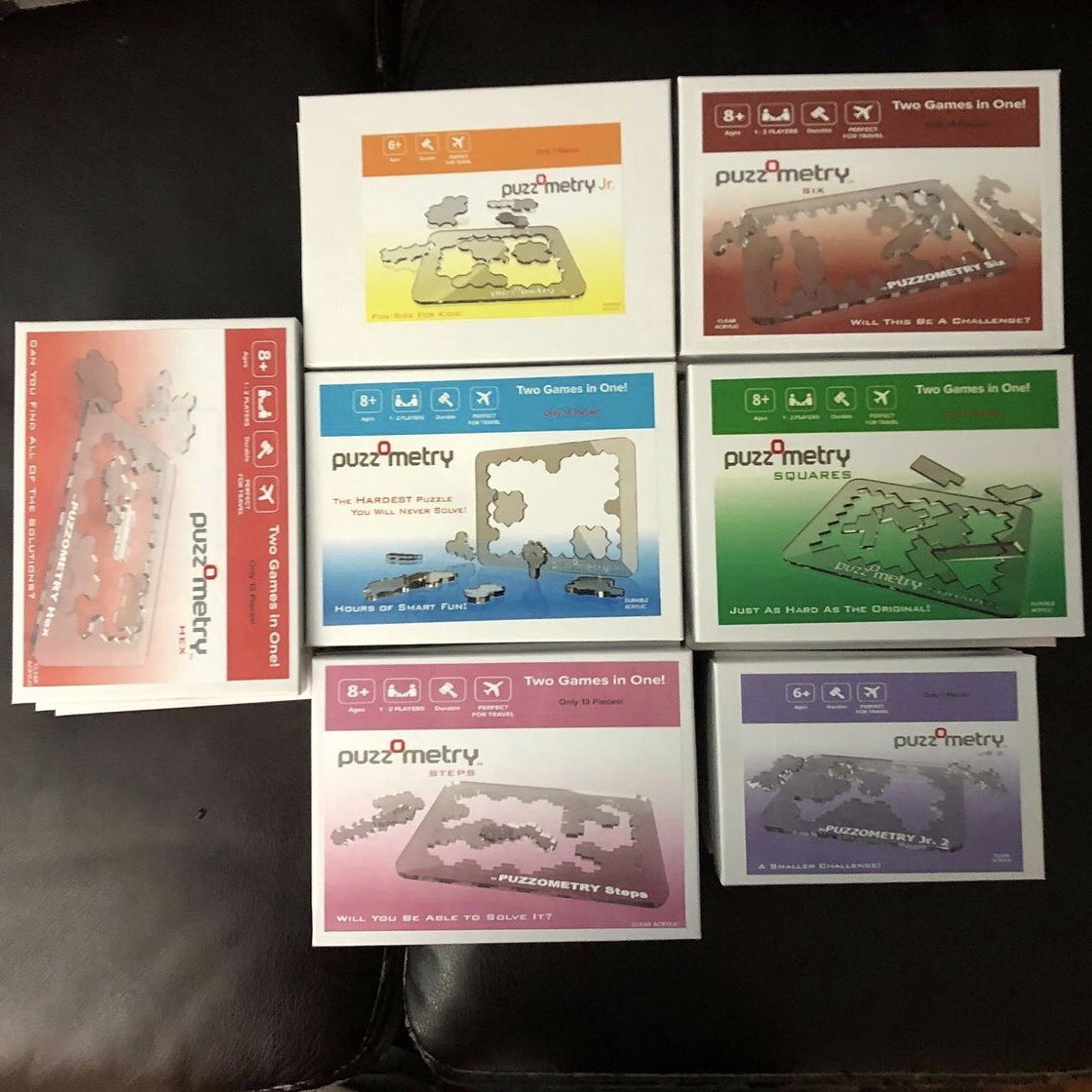 All seven varieties of Puzzometry puzzles are fun, challenging and unique!  Get them on <a href="/amazon/">Amazon</a> (search for “Puzzometry”), on <a href="/etsy/">Etsy</a> (search for “Puzzometry”) and at Puzzometry.com  ALWAYS FREE SHIPPING  #freeshipping #freeshipping #puzzles #clearpuzzles