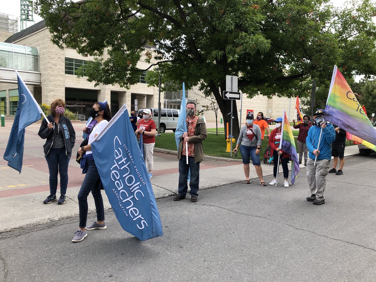 oectaottawa's tweet photo. Ottawa Catholic Teachers proudly marching in the Labour Day Parade! (Just before the rain began!) #Solidarity #WorkersAretheRecovery https://t.co/gMcHHrilxg