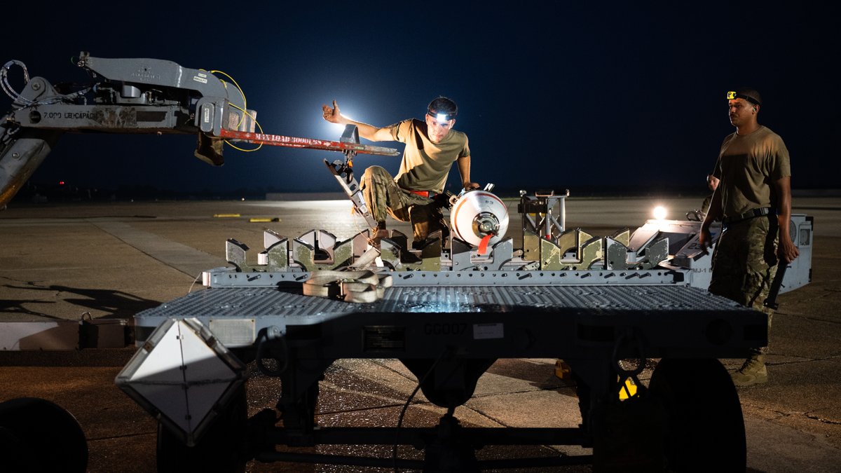 usairforce's tweet photo. #Airmen from the 2nd Aircraft Maintenance Squadron load a Mk-62 Quickstrike naval mine onto a B-52 Stratofortress during a training exercise at @TeamBarksdale, Louisiana. The B-52 has the ability to employ naval mines, as well as conventional weapons. @USNavy @AFGlobalStrike https://t.co/G1cQqEUtG5
