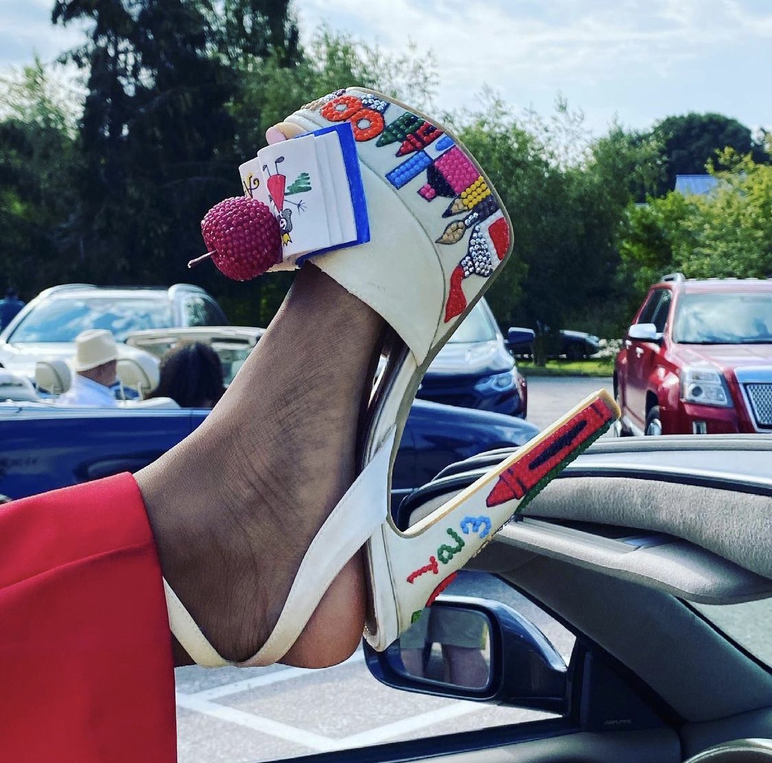 <a href="/MissAmerica/">Miss America</a>’s “Show Me Your Shoes” parade was today! Braxton looked amazing in her red jumpsuit, skirt made of children’s book pages, and shoes hand painted by <a href="/arenstraiger/">Aren Straiger</a>!! <a href="/MissIndiana_Org/">Miss Indiana Scholarship Organization</a>