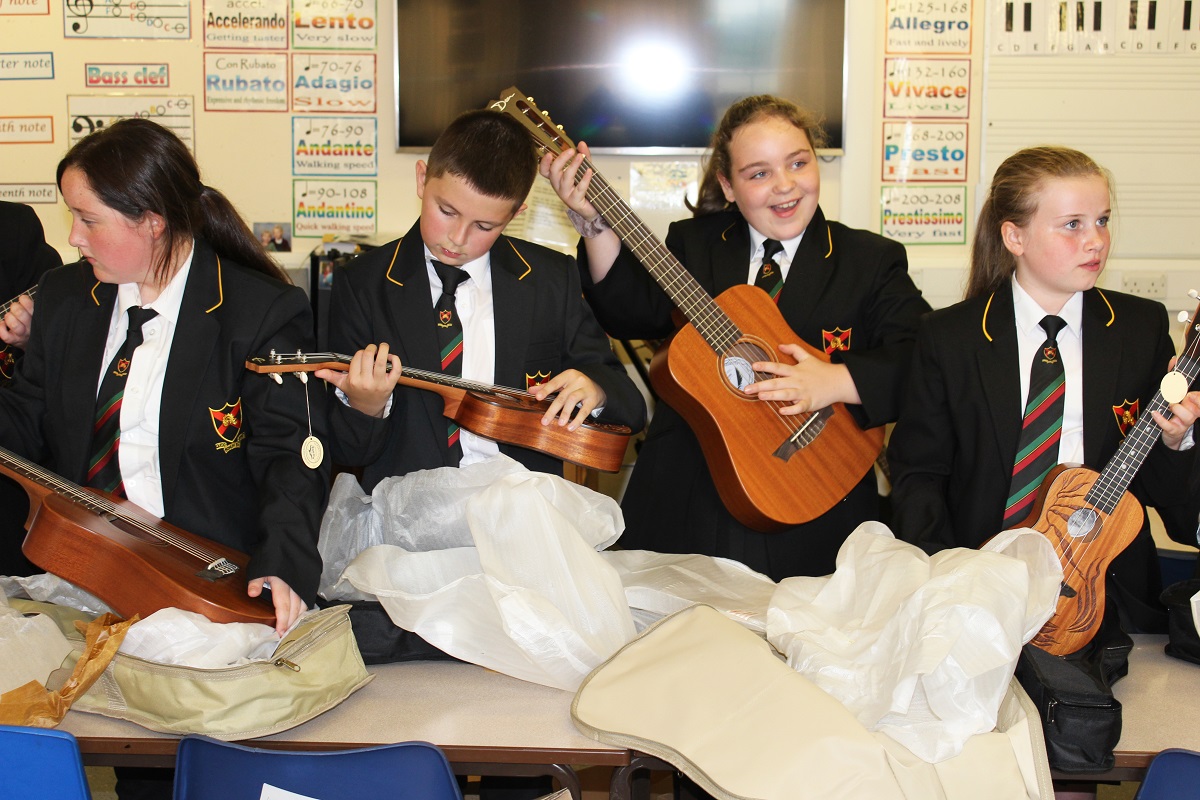 🎸 Thank you to 'Music for All' who have donated 10 acoustic guitars and 10 ukuleles to our school.
These high quality instruments from <a href="/DeanGuitars/">Dean Guitars</a> and <a href="/lunaguitars/">Luna Guitars</a> will be used to launch our SJF Strummers group. 
Pictured are some of our year 7 pupils unpacking the delivery!