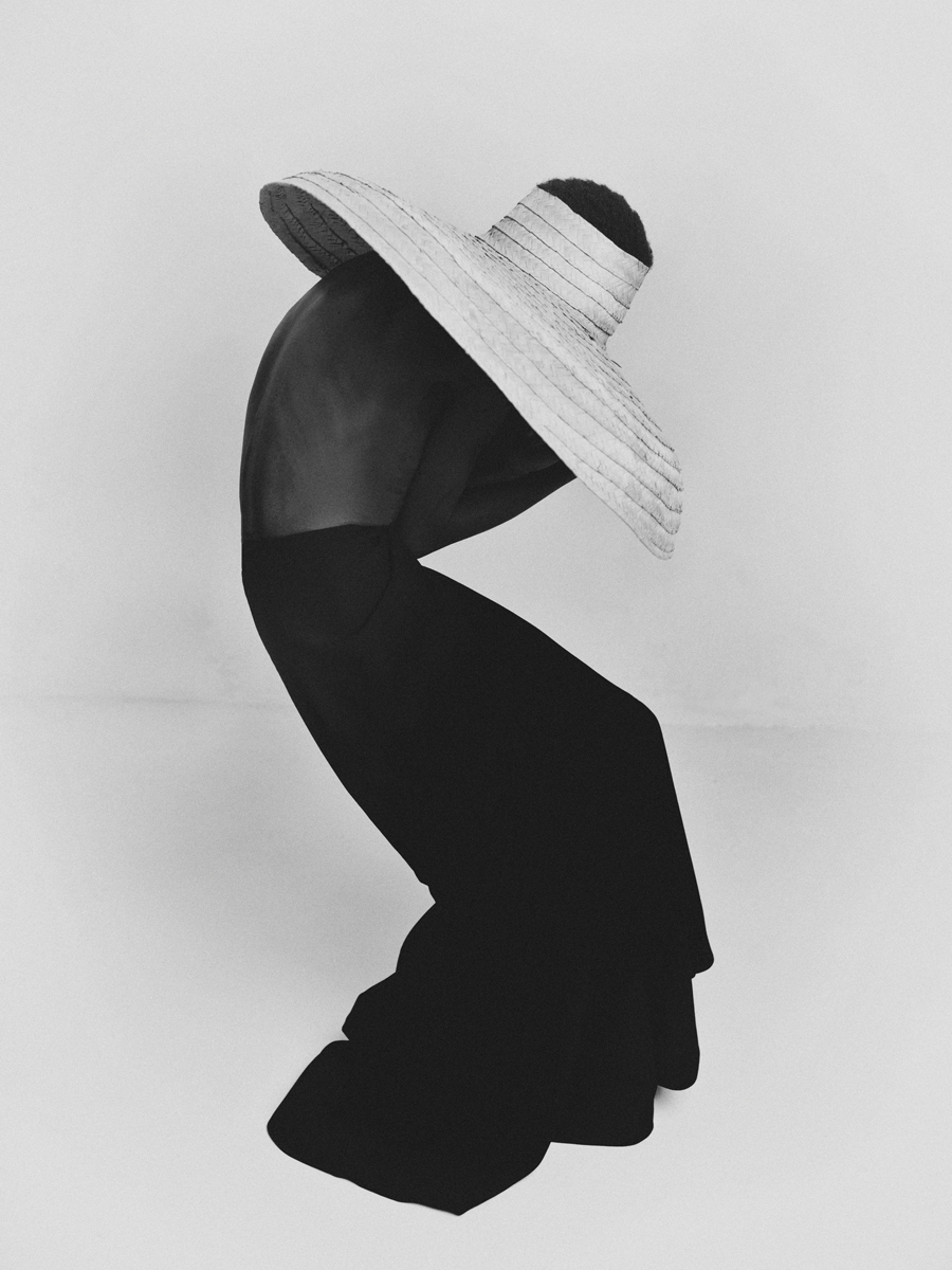 AestheticaMag's tweet photo. Bastiaan Woudt's bold, monochromatic portraits abstract the human form. A figure stands in a oversize hat and trousers, contorting into a deep zigzag shape. 

@PhotoLondonFair until 12 September: https://t.co/dA6ELOE1Tc https://t.co/AQpRn8X7Bt