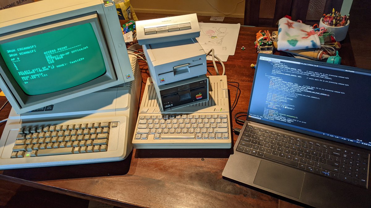 This has been my development environment for the last couple weeks.  ESP32 coding happens on the laptop.  BASIC coding that doesn't need to see the Apple2Idiot card is done on the //c, then written to a floppy which is tested on the //e with the card installed. #apple2forever
