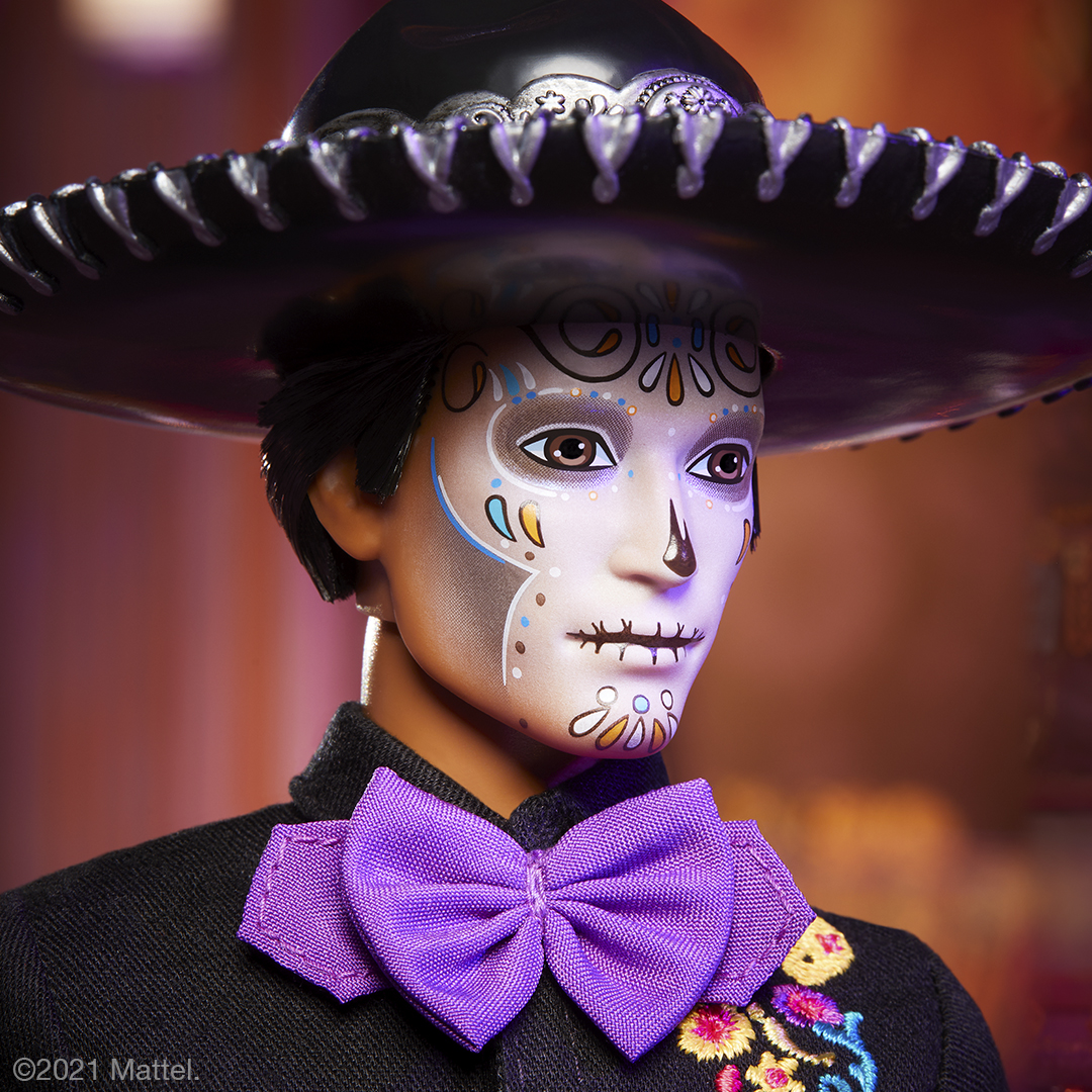 A shoulder-up shot of the Ken doll, spotlighting his face paint and sombrero