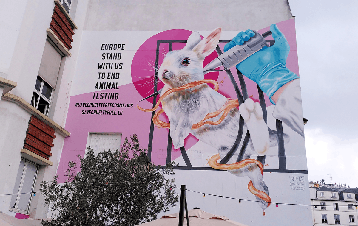 peta's tweet photo. Cruelty is always ugly! 

That’s why this beautiful mural in #Paris is encouraging EU citizens to #SaveCrueltyFreeCosmetics. 

Join the movement ➡️ https://t.co/CN52TAca9t https://t.co/latRQ1zTK4