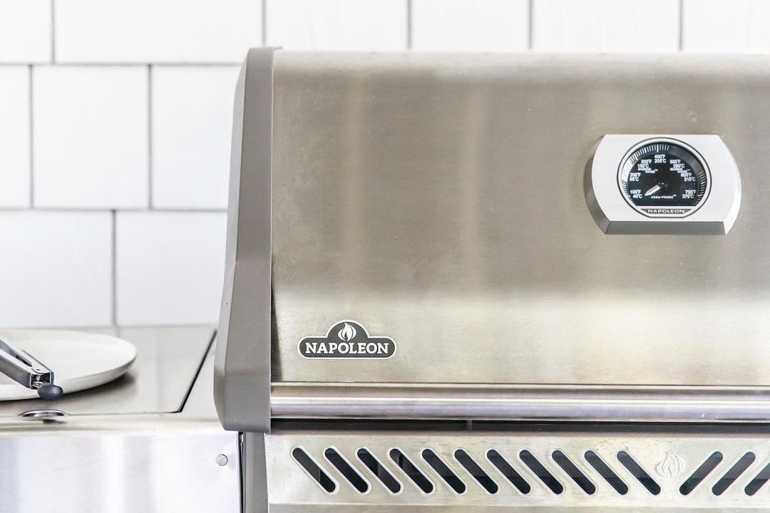 NapoleonProduct's tweet photo. @kvbijou surprised her husband Terry with this @napoleonproduct grill last summer &amp; they absolutely love it! They definitely love to live outside during these warmer months &amp; bbq daily. They are still trying to figure out what to put above it… a clock? Art? What do you think? https://t.co/tykFLJaEjS