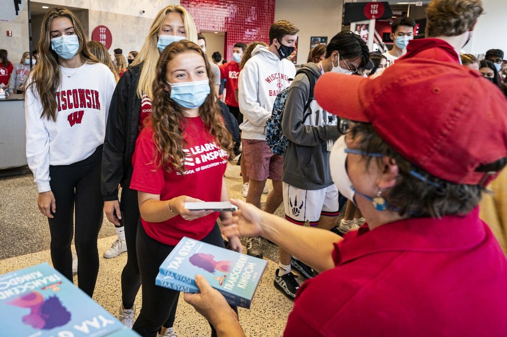 GoBigRead's tweet photo. We had so much fun welcoming new Badgers to campus with copies of this year's Go Big Read book, "Transcendent Kingdom," at convocation on Friday! @UWMadison @UWNewStudent 

https://t.co/RiKKXN5zpE https://t.co/HEeJMUlfIj