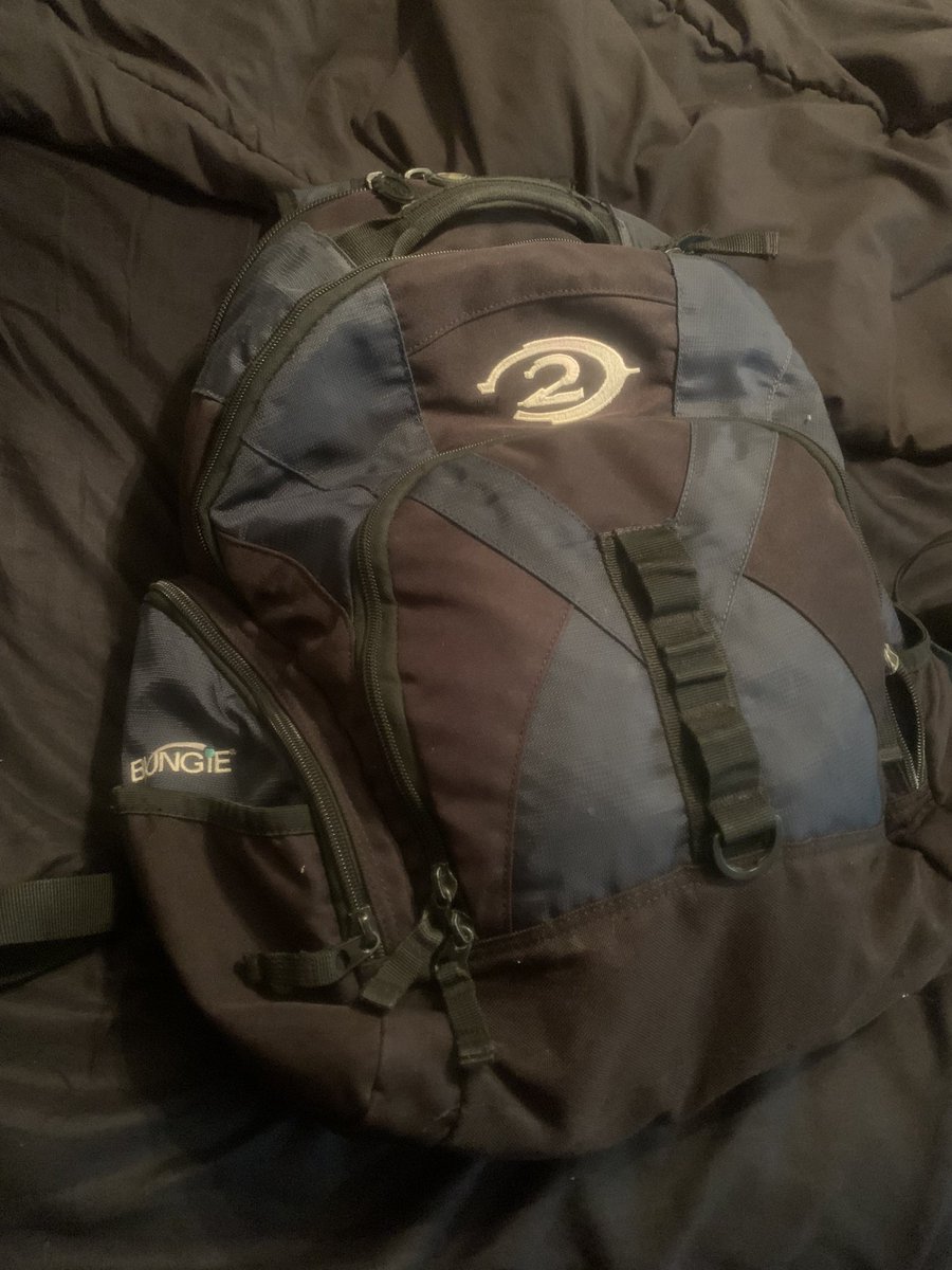 wheelus_david's tweet photo. How many people still have there Halo 2 Bungie Backpacks from back in the day, Mines still going strong, and Always by my side. @Bungie @BungieStore https://t.co/f1VF1jQkCu