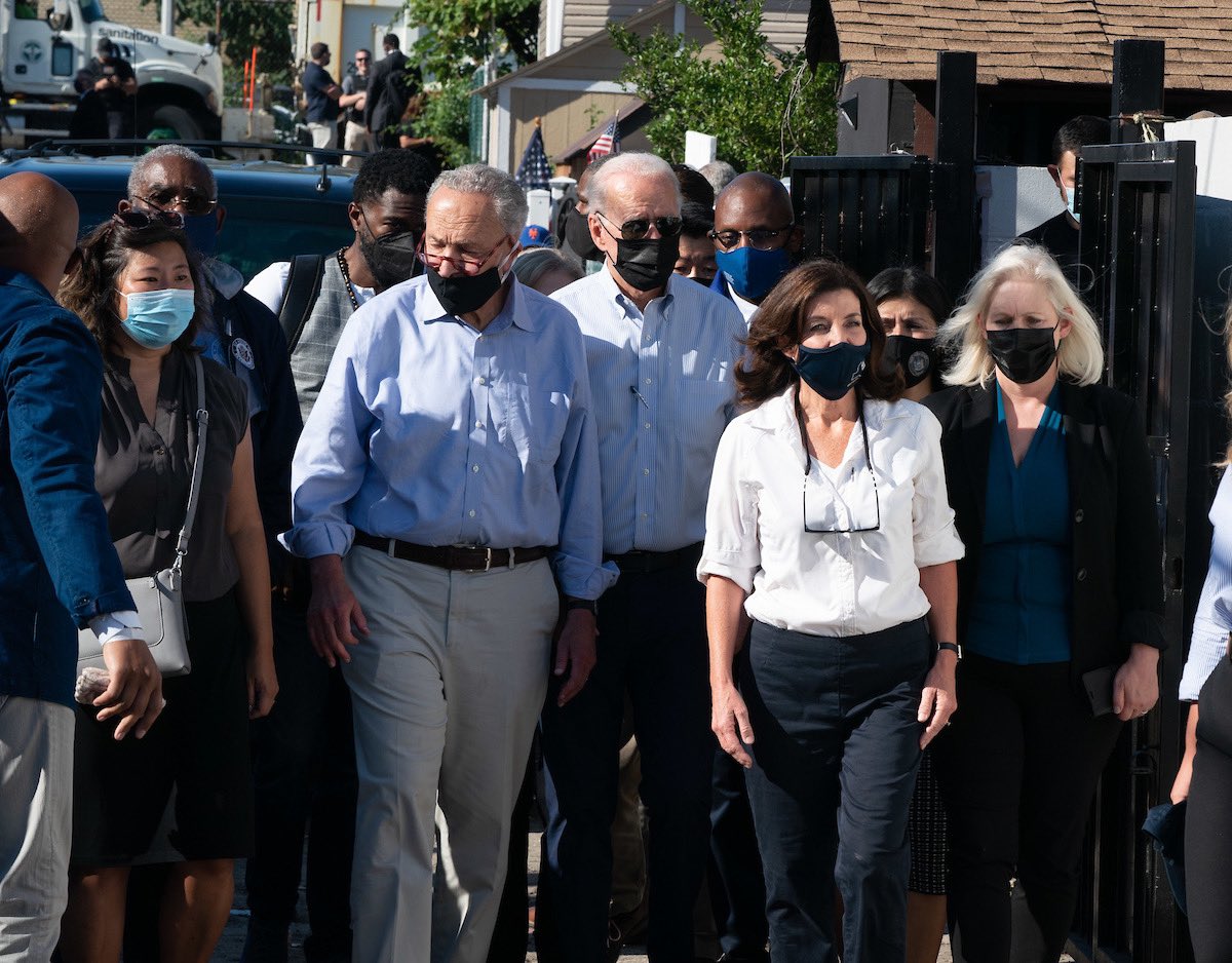 Governor Hochul walks outdoors with President Biden, Senator Gillibrand, Senator Schumer, and others
