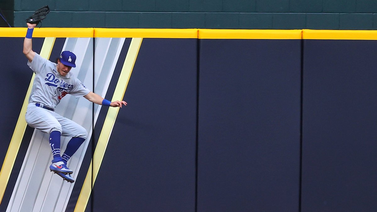 Cody Bellinger’s Spectacular Catch Steals Home Run Ball From Fan Holding On By A Thread bit.ly/3jM1vSx