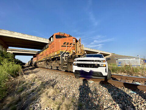 FWFDLT's tweet photo. Don’t try crossing the tracks in any random place, you may get stuck!!Luckily the train was only going 18mph when they hit. Still drug the truck about 200 feet. No one was hurt.  Happened in NW Ft. Worth. @DFWscanner https://t.co/vbkLNtNl8M