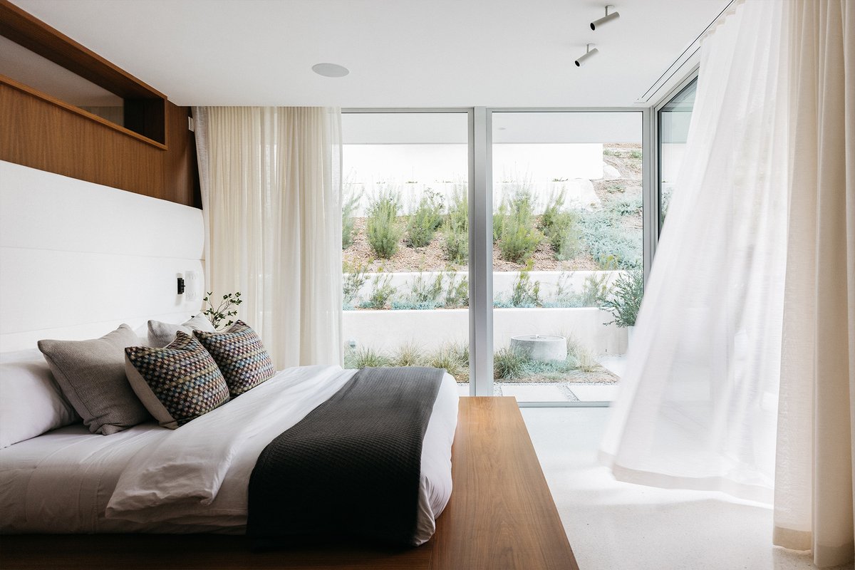 A meticulous and sophisticated restoration and transformation of a single story 1957 mid-century, originally designed by Alfred T. Wilkes. Located in Beverly Hills
Offered at $12,500,000
Represented by Lisa Optican | View More: bit.ly/3jRXzzD