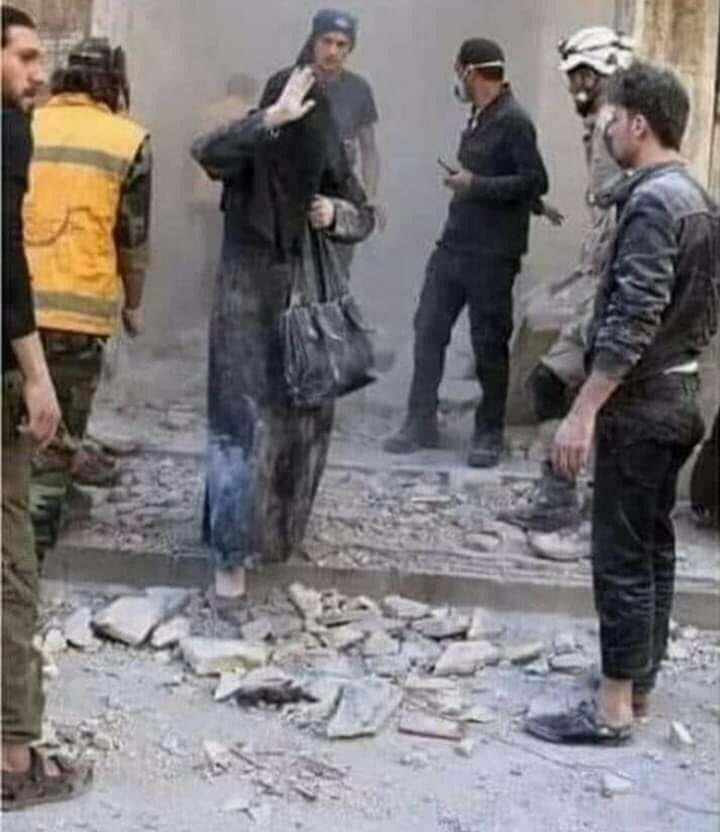 #يسقط_النقاب

سقط منزلها ولم يسقُط حجابها
ترفع يدها مُشيرة أنها بخير كَي 
لا يلمسها أحـد ...
شموخ فـي زمن الإبتذال ...وحياء في زمن العُري
