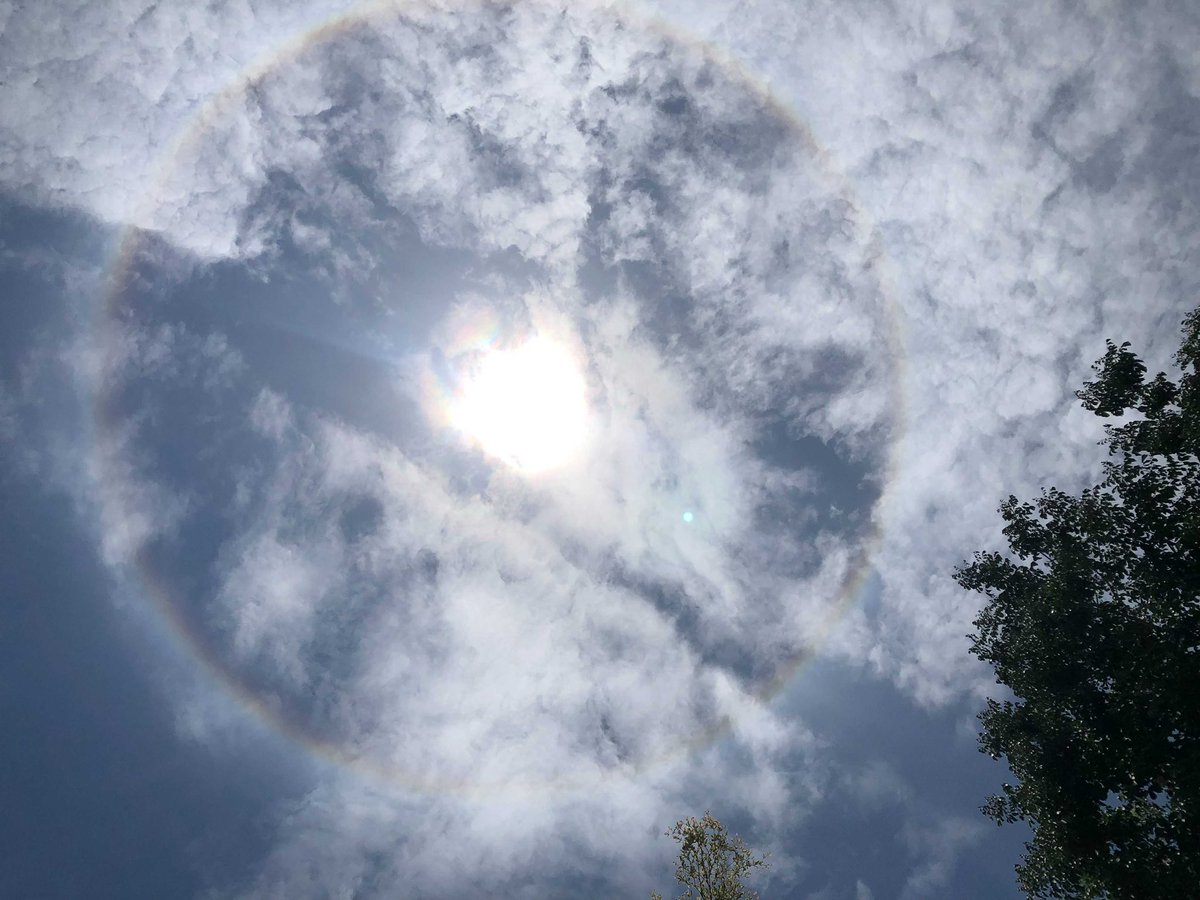TODAYonline's tweet photo. Spotted in Singapore today: A sun halo around noon. Did you see it? RT and share your images with us! 🌤️ (Photos: Kenneth Cheng/TODAY and Laura Philomin) https://t.co/lK4bjC6Jcl