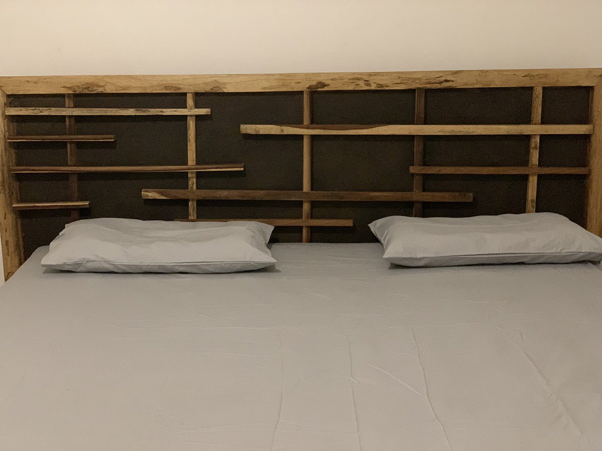 Was bored and decided to make us a sliegh bed with some storage..