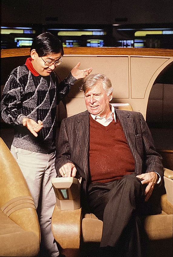 MikeOkuda's tweet image. Happy Star Trek Day! Remembering when Gene Roddenberry sat in the captain’s chair and asked me to stand with him for a photo. He said, “I’m going to point at this control panel as if to demand to know how it works. I want you to throw up your hands as if to say you have no idea.”