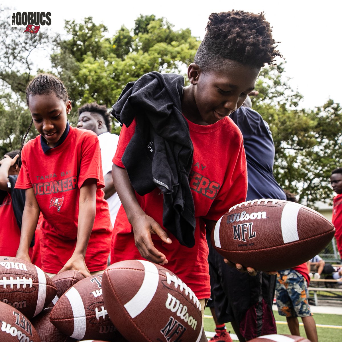 Buccaneers's tweet photo. We teamed up with @Fanatics &amp; @SportsTampaBay to host the Forever 55 Football Clinic supporting the Replay Tampa Bay annual sporting goods drive.