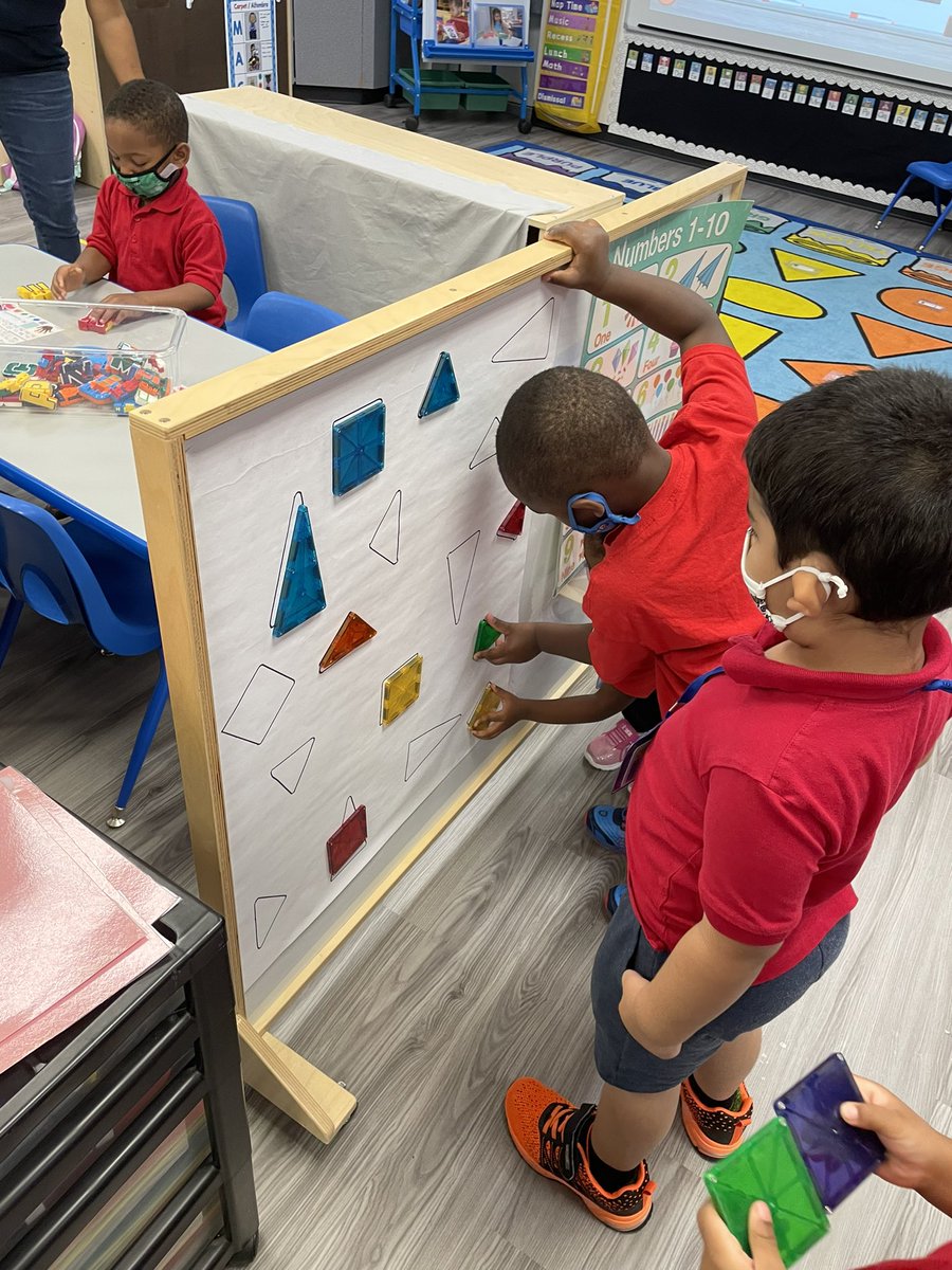 Matching shapes in our math center! #RISDPrek